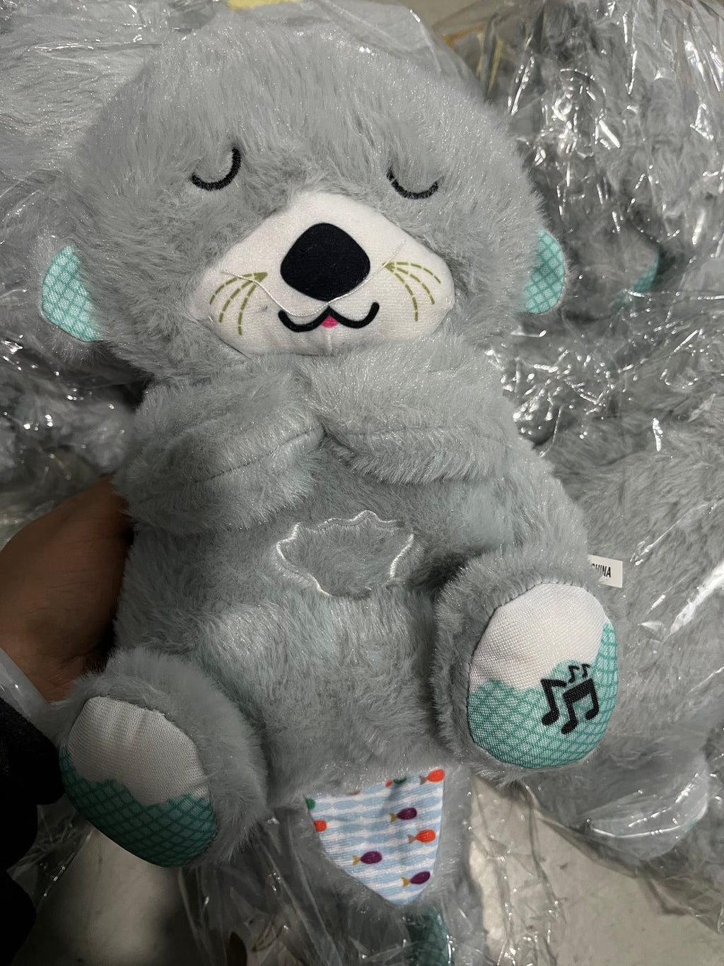 Peluche loutre Sound Machine Soothe 'n Snuggle avec lumières, sons et mouvements de respiration rythmiques pour bébé